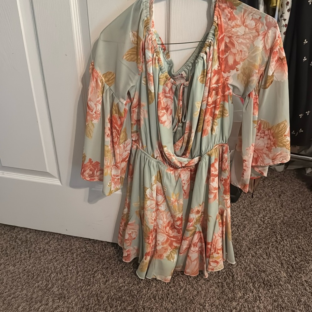 Off the shoulder romper with floral details! Only worn once!